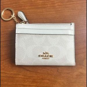 Coach Skinny ID case